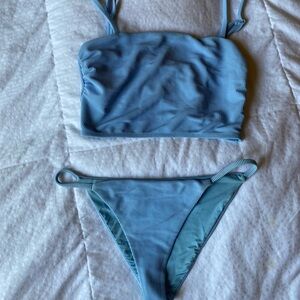 Beach riot tank kini
